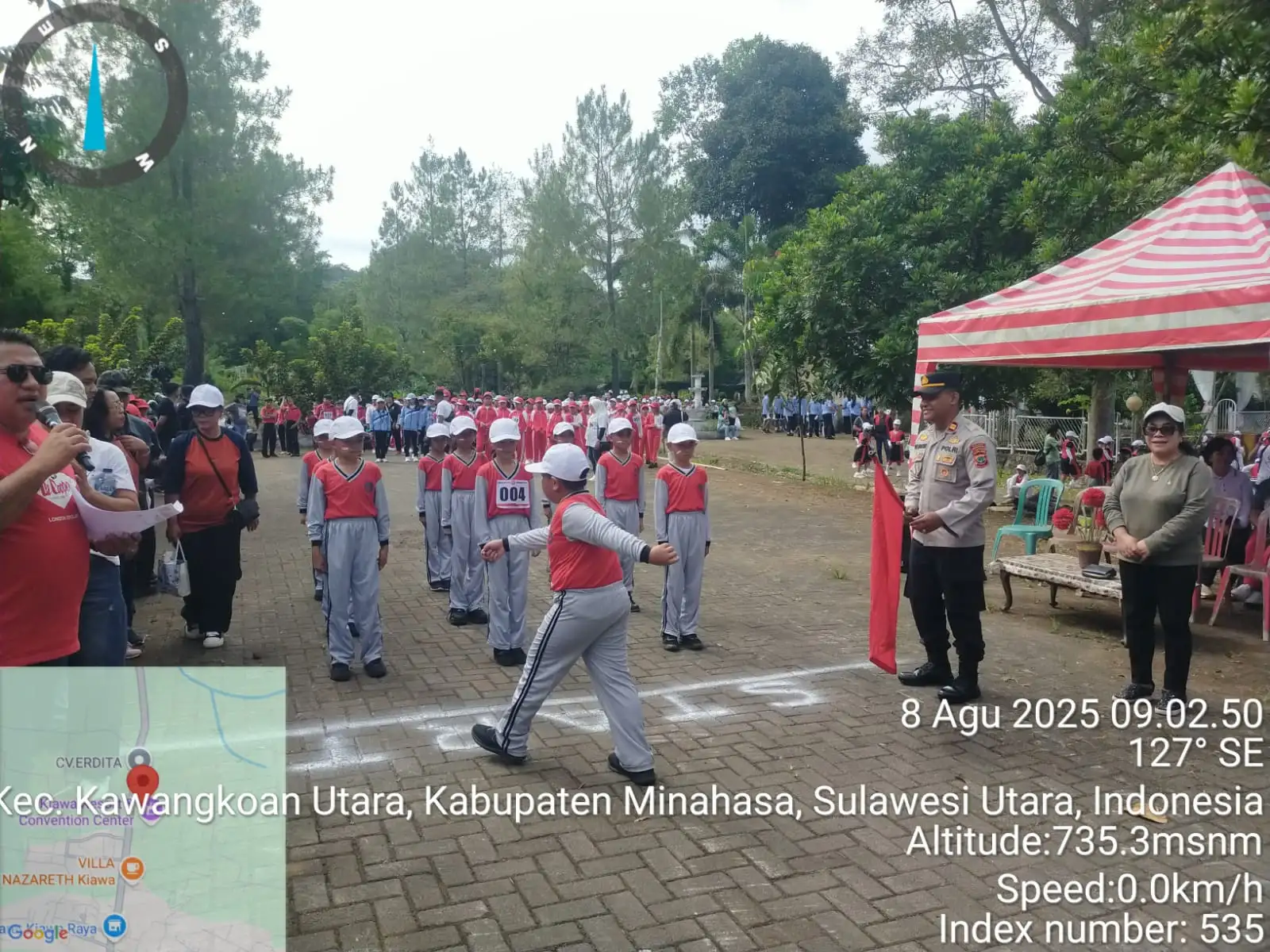Kapolsek Kawangkoan Pimpin Langsung Pengamanan Lomba Gerak Jalan HUT ke-80 RI